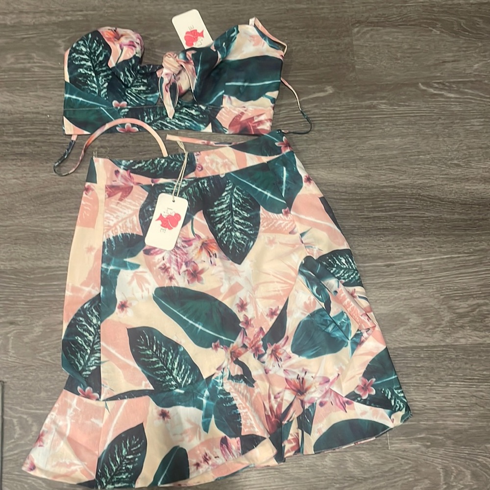 Two piece floral skirt and crop top set.